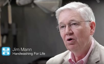 Jim Mann with Handwashing For Life logo