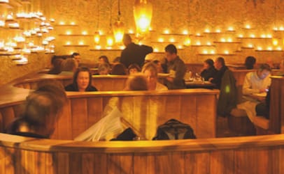 According to the restaurant's website, votive candles are lit every night at Toulouse Petit Kitchen & Lounge in Seattle to enhance the New Orleans atmosphere created by the menu.