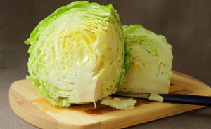 http://www.dreamstime.com/royalty-free-stock-photos-head-cabbage-cutting-board-image41281588