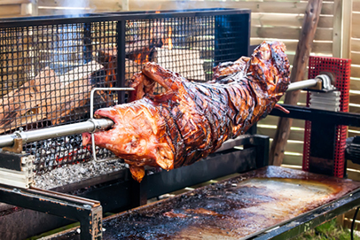 http://www.dreamstime.com/royalty-free-stock-photo-roasted-pig-rack-turning-over-coals-roast-image35918525