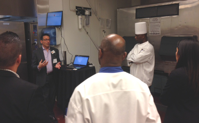 Steve Russak, COO of CloudClean, describes the capabilities of a new hand wash performance system with chefs from a variety of casino kitchens Tuesday. The system converts current handwash rules into a staff reminder and reporting program. The electronic network set up for handwash verification has a secondary use for tracking temperatures during food preparation and storage. (Photo by Jim Mann)