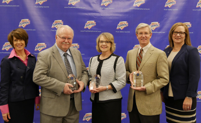 NSF Food Safety Aware presenters and honorees at the 18th annual Food Safety Summit are (from left): presenter Shelly Feist of the Partnership for Food Safety; honorees John Butts, Judy Harrison, Gary Acuff, who accepted the award for Purnendu C. Vasavada; and presenter Lori Stephens, of NSF International.