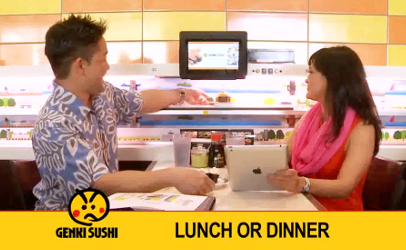 Genki Sushi restaurants feature a conveyor belt delivery system for food, sending plates of raw seafood winding through tables and patrons.