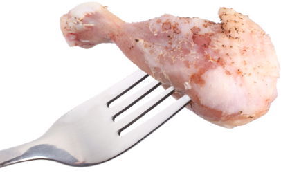 raw chicken leg on fork