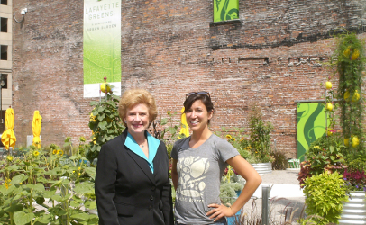 Sen. Debbie Stabenow, D-MI, at the Lafayette Greens Community Urban Garden in Detroit to discuss the importance of local agriculture with Garden Manager Gwen Meyer, right.