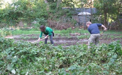 Workers at Urbandale Farm, in a low-income and diverse neighborhood on the eastside of Lansing, MI, help provide fresh, affordable food for residents. The farm is in the city’s 100 year flood plain, using land that otherwise might be unclaimed. It trains three to four urban farm apprentices each year. (Photo courtesy of Urbandale Farm)