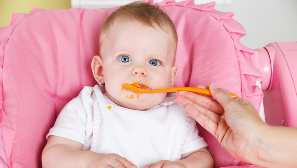 feeding baby food