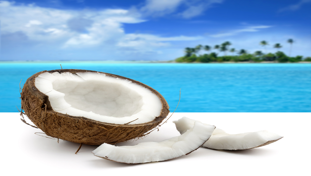 coconut on white background and beautiful seascape